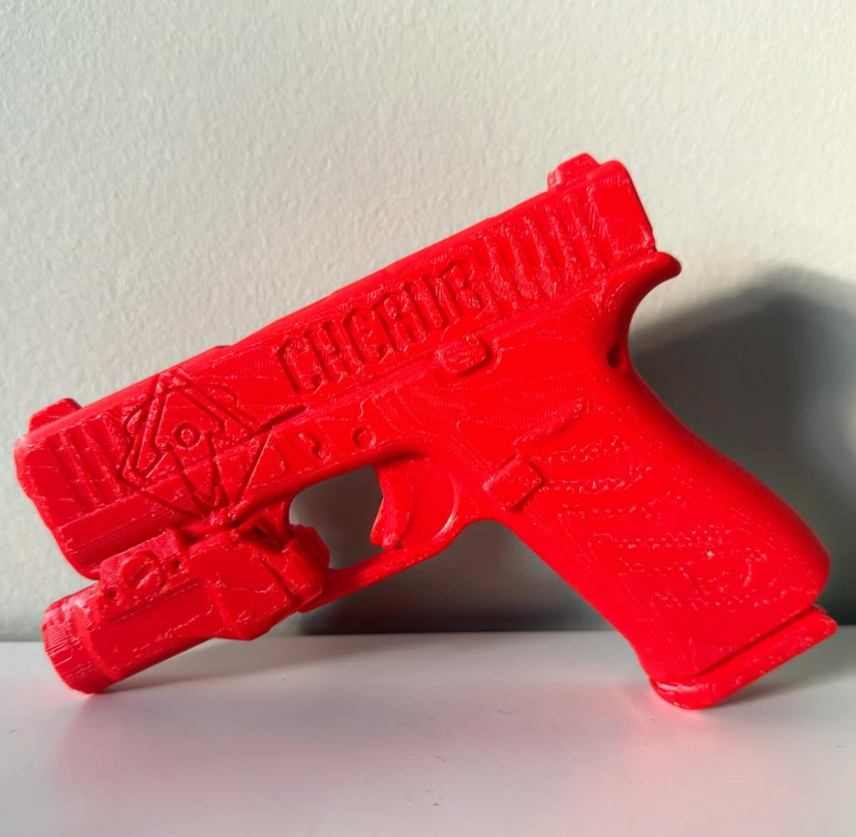 ARMA DE ENTRENAMIENTO CON LINTERNA